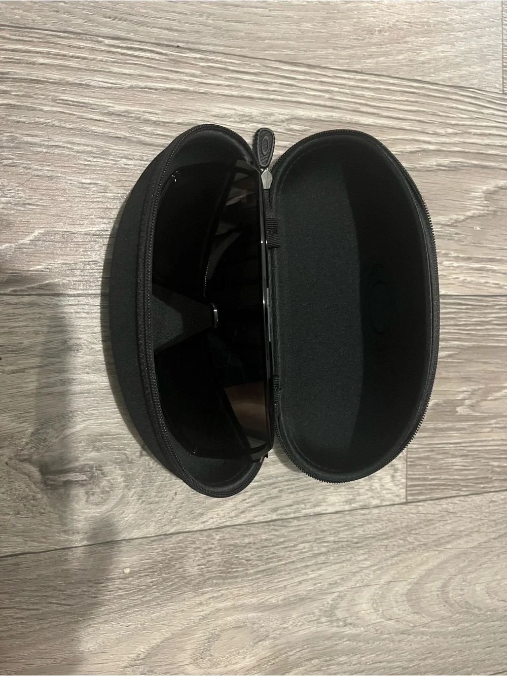 Oakley Black Sunglasses with Dark Lenses